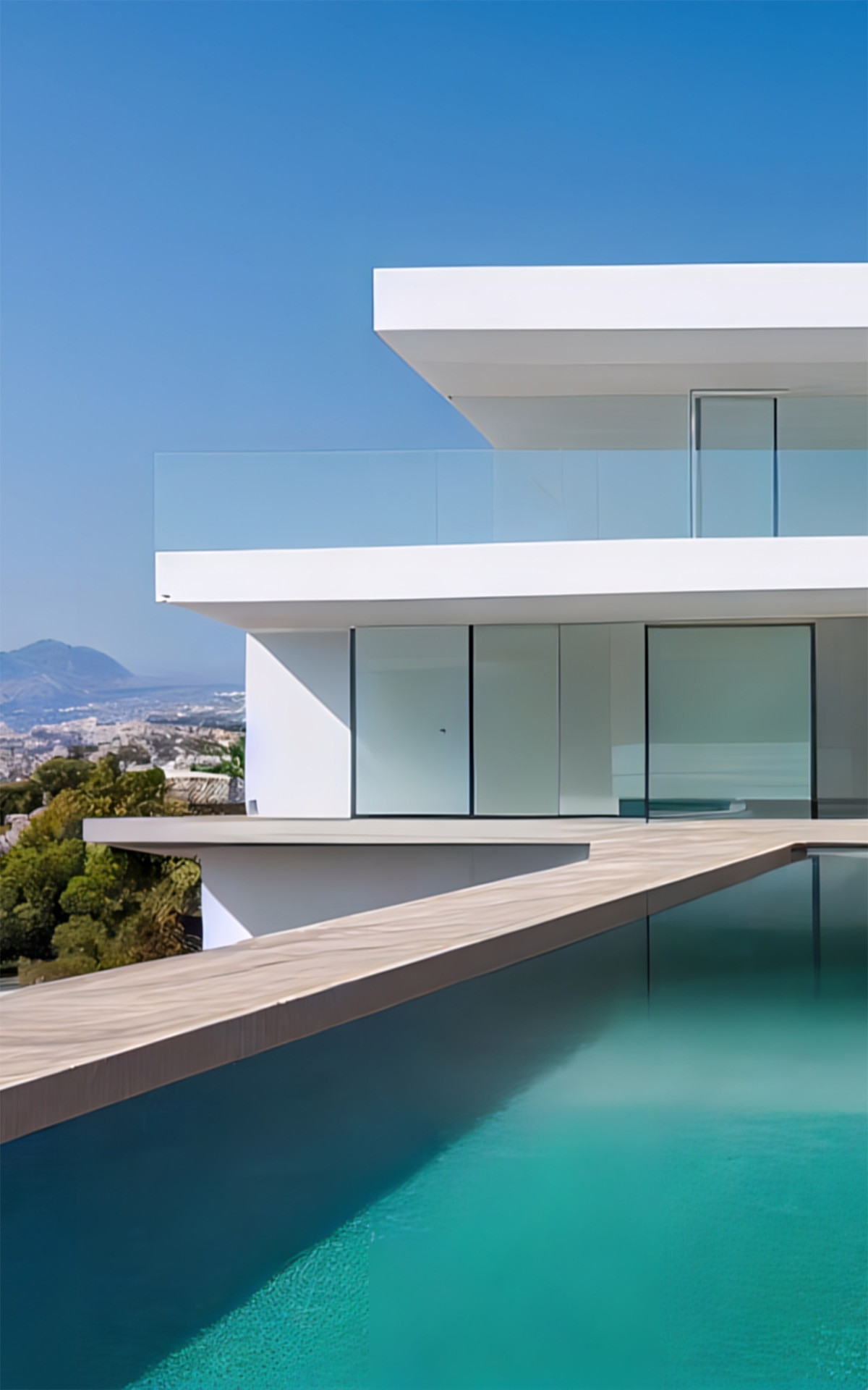 Image of a contemporary house full of glass systems with a swimming pool and a bright blue sky.